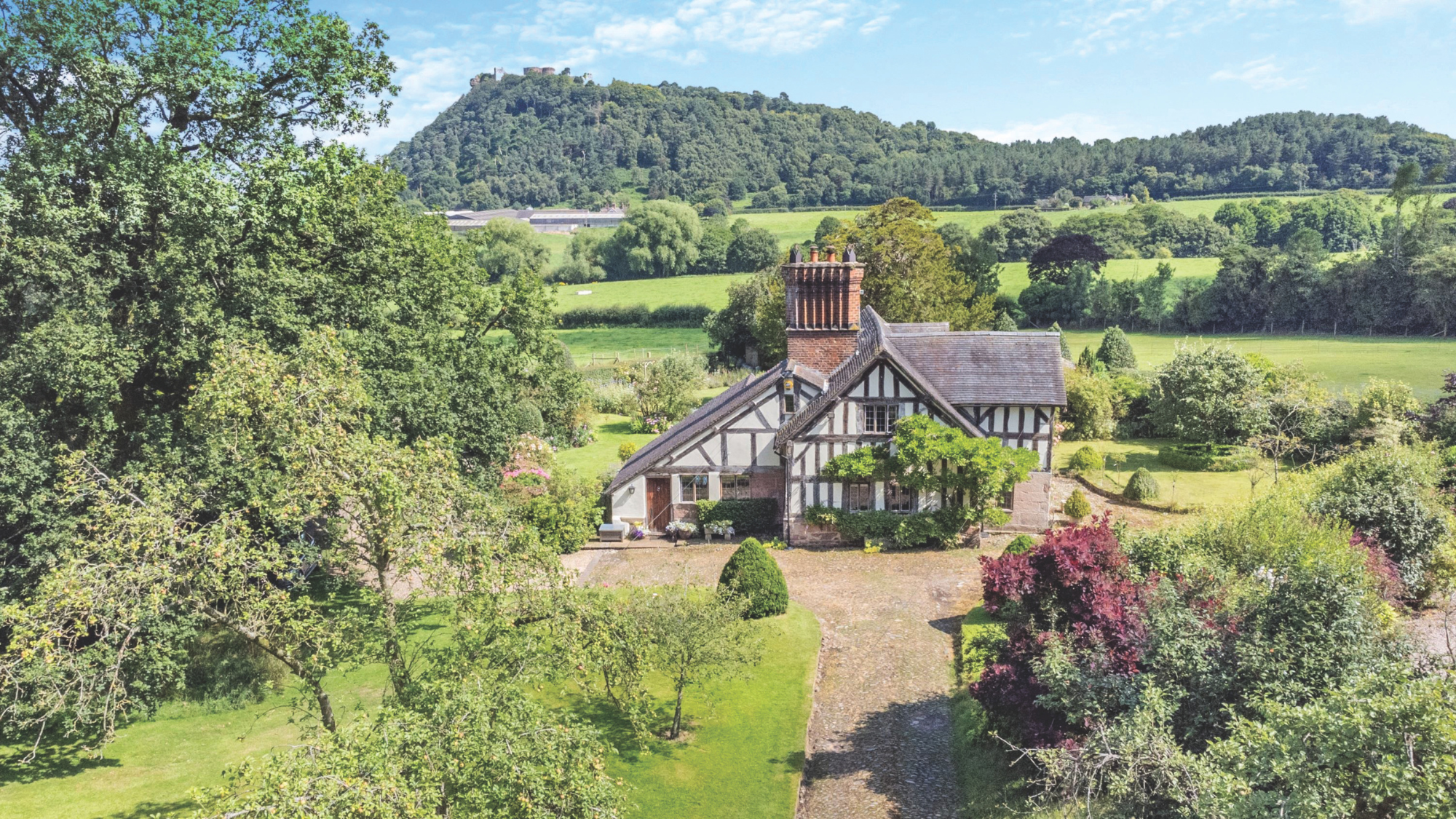 A former farmhouse in a country setting with a productive kitchen garden.