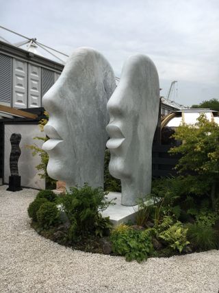 Giant marble heads - 2018 Chelsea Flower Show