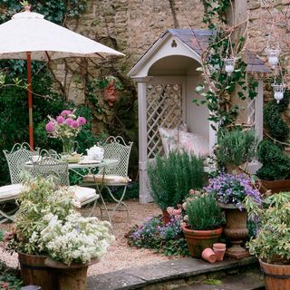 country style cottage garden with arbour