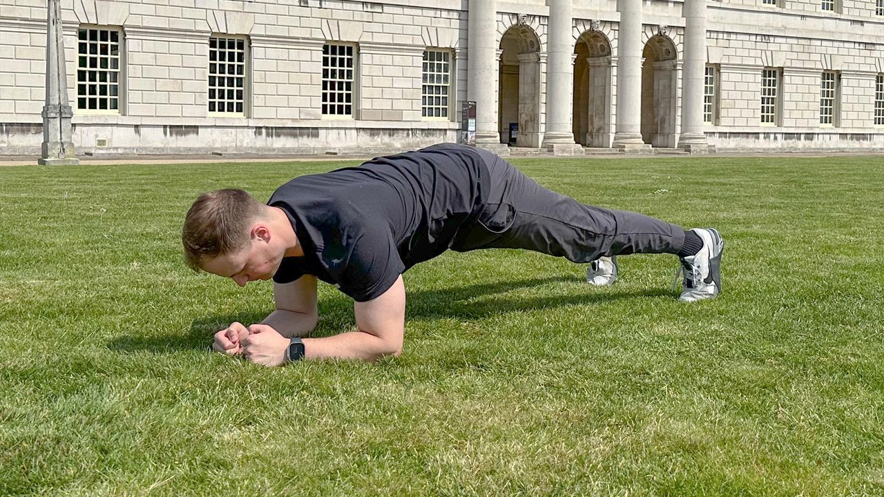 Ollie Thompson holding a plank position