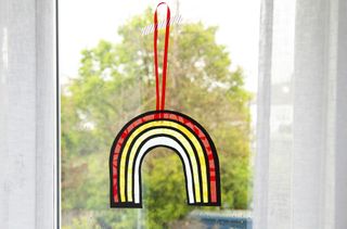 Easy crafts for kids illustrated by rainbow hanger