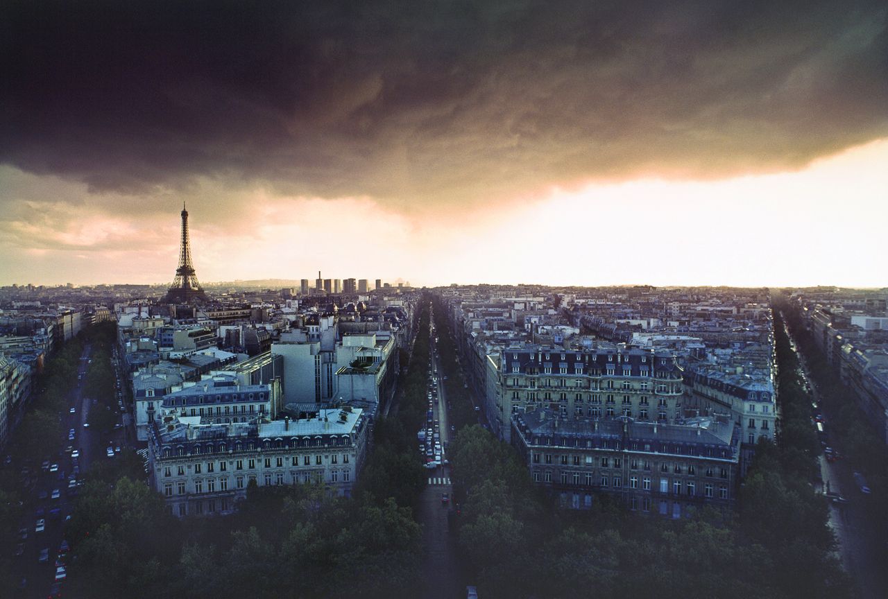 A storm gathers over Paris.