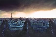 A storm gathers over Paris.