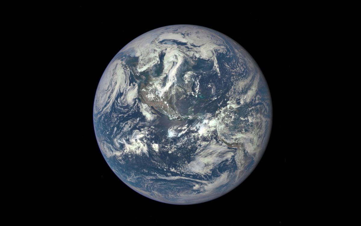 full-disc view of earth against the blackness of space