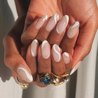 Wavy white nail design