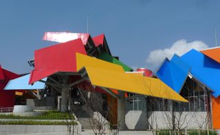 The Museum of Biodiversity in Panama. The roof has angled panels in different colours.