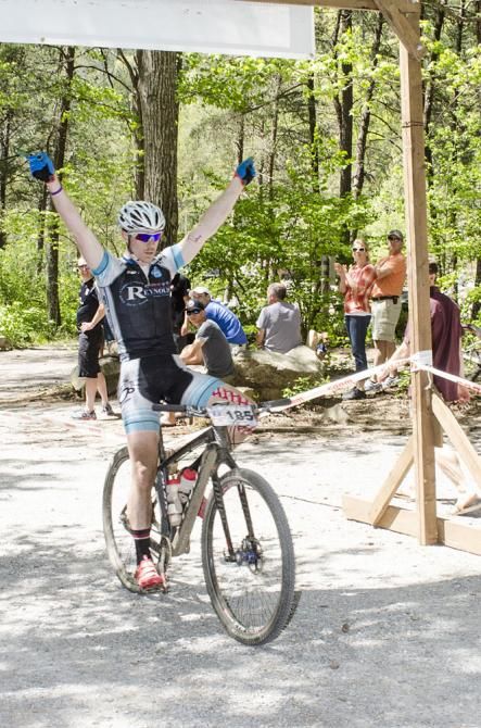 A rider celebrates finishing up