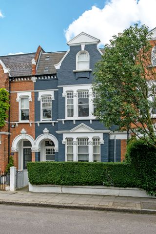 outside of a victorian terraced house photographed by polly eltes