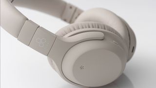 Final Audio UX2000 headphones in cream, on white background 