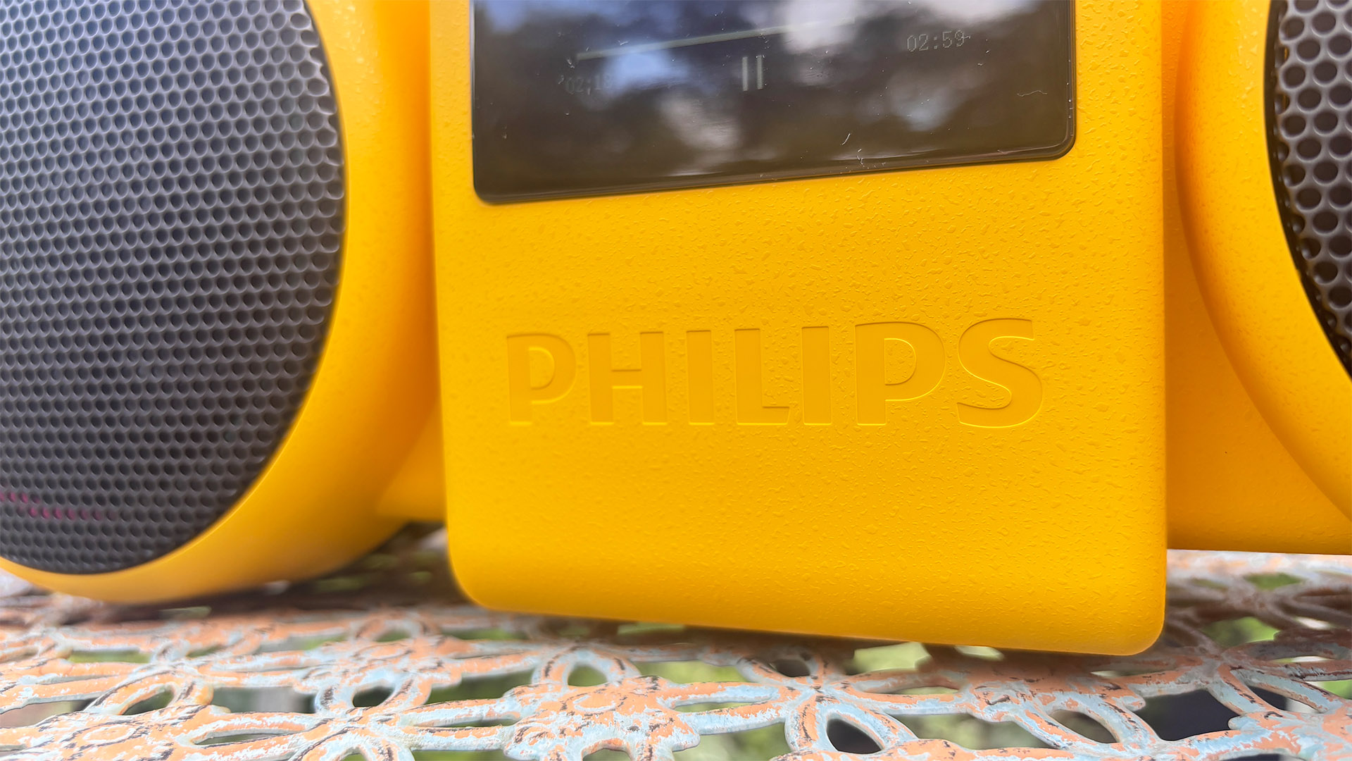Philips The Roller wireless speaker close up on Philips logo