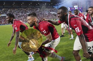 Fikayo Tomori (right) has just won Serie A with AC Milan