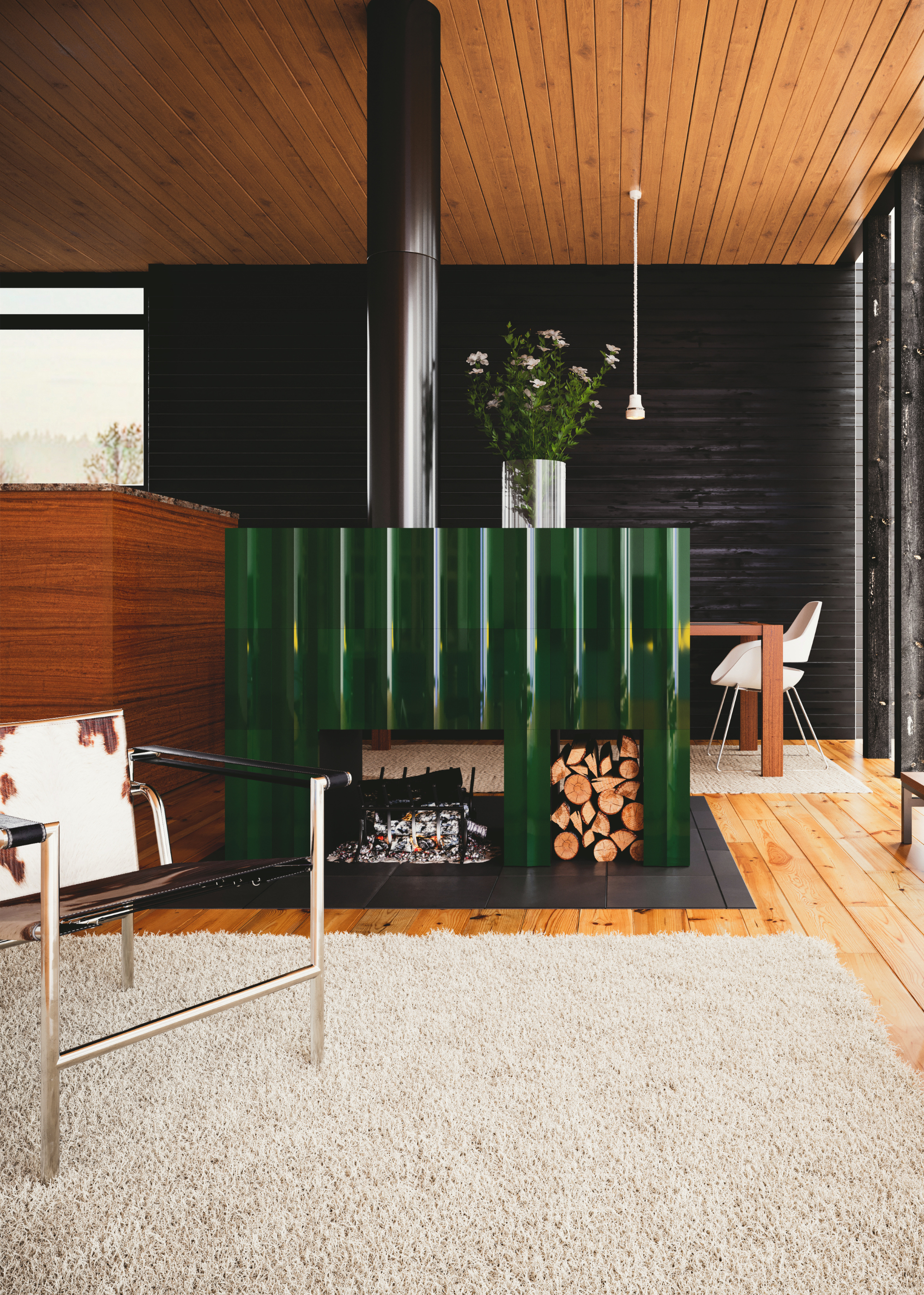 a living room with modern green wood burner in the centre of the space with pale paneled wood ceiling, black painted wood paneled walls and wood flooring with a cream rug on top