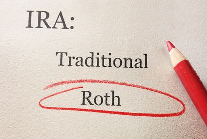 Traditional and Roth IRA circled in red pencil -- retirement concept