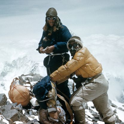 Edmund Hillary and Tenzing Norgay preparing to summit Everest 