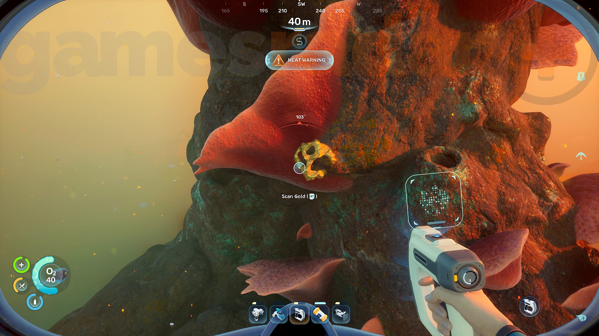 A piece of Subnautica 2 gold on the side of a rocky outcropping