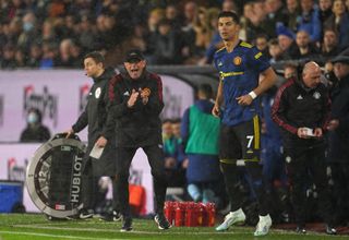 Manchester United manager Ralf Rangnick reacts on the touchline as substitute Cristiano Ronaldo prepares to enter the game at Burnley