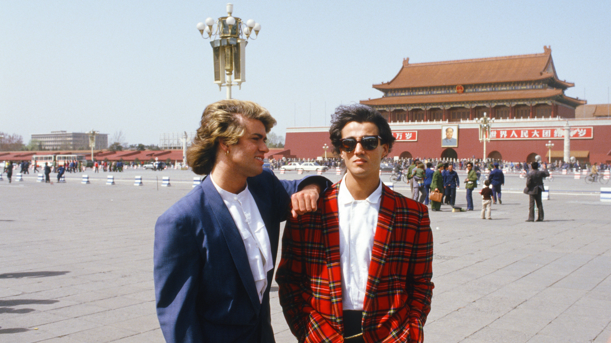 George Michael and Andrew Ridgeley pictured in front of the Forbidden Palace in Tiananmen Square, Peking