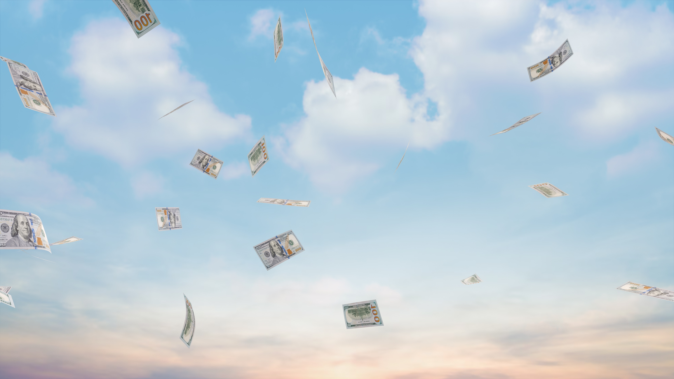 money paper bills flying in the sky