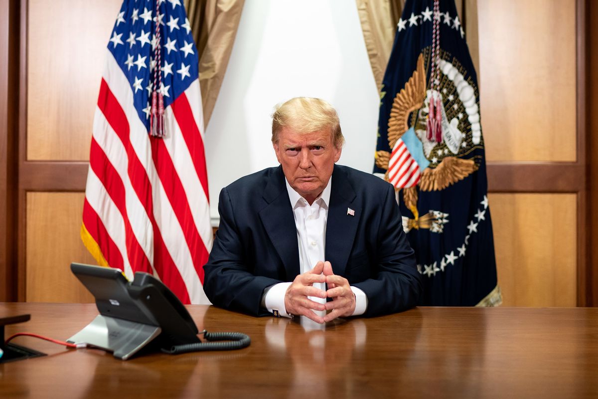 Donald Trump Sunday, Oct. 4, 2020, in his conference room at Walter Reed National Military Medical Center in Bethesda, Md.