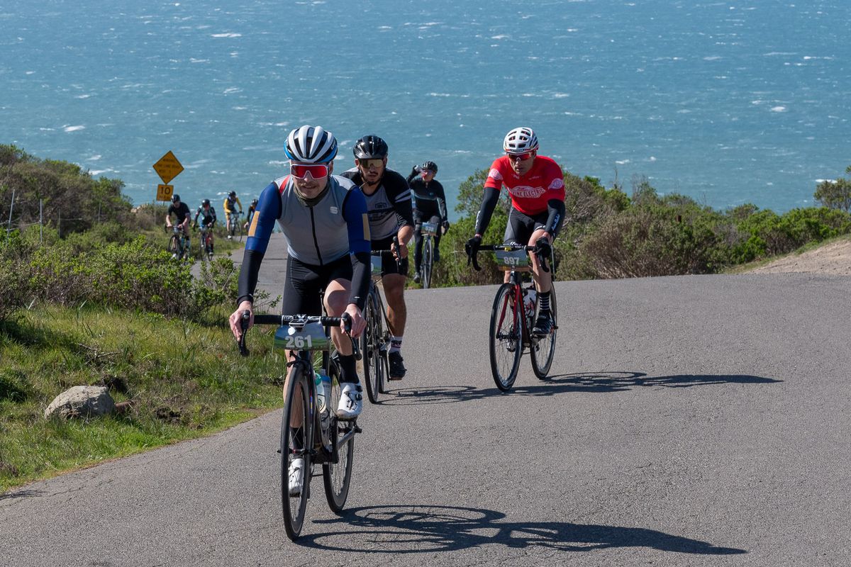 A group tackle a climb on course