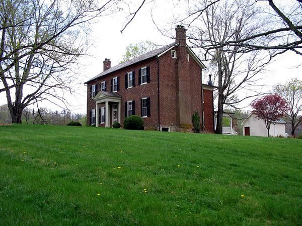 Out in the country there are nice brick colonial farm houses