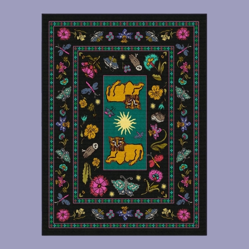 Image of a black rug with a teal, yellow, and pink pattern on it that resembles the Persian style. It&#039;s on top of a purple backgorund.