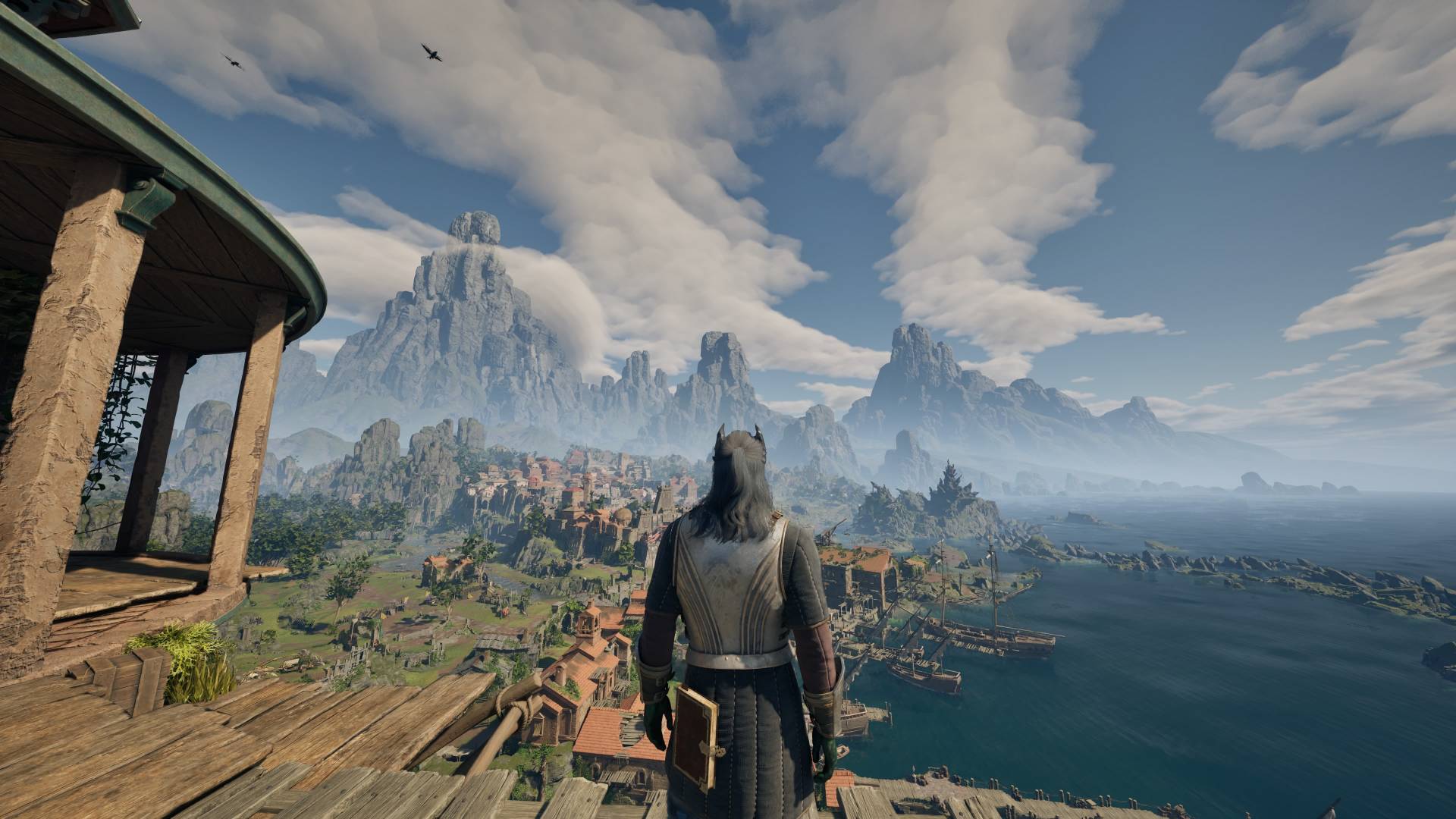 In Avowed, the aumaua Envoy looks out over the expansive vista of Dawnshore from the top of the lighthouse