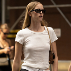 woman wearing a white t-shirt in New York City.