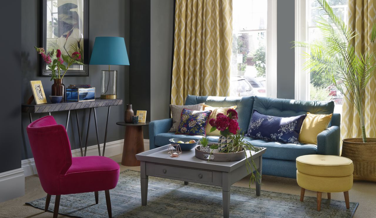 navy sofa in navy living room