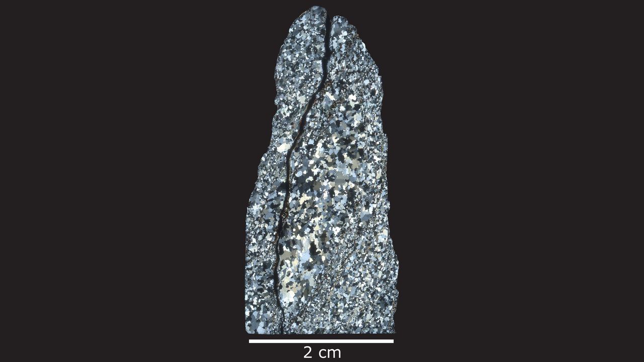 A thin, polished section of quartz rock from Jack Hills.