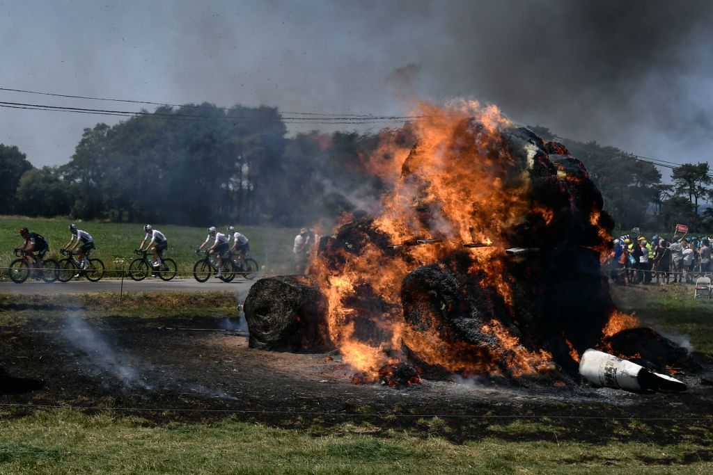 Road art gone wrong: hay bales catch fire at the Tour de France
