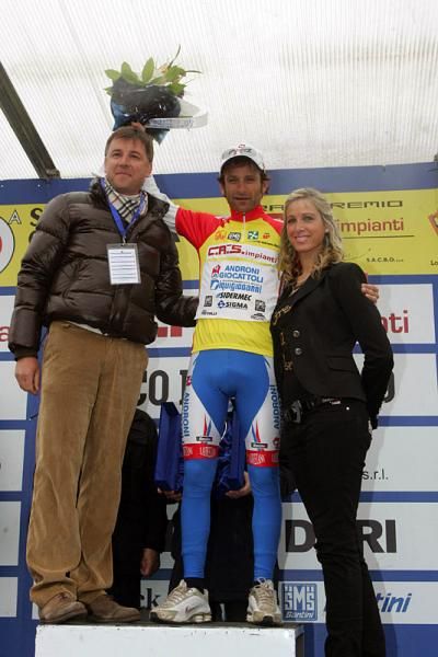 Michele Scarponi (Androni Giocattoli) on the podium for his overall victory.