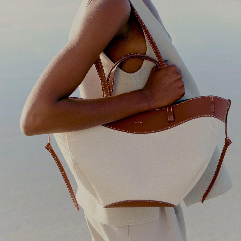 white canvas tote with tan detail
