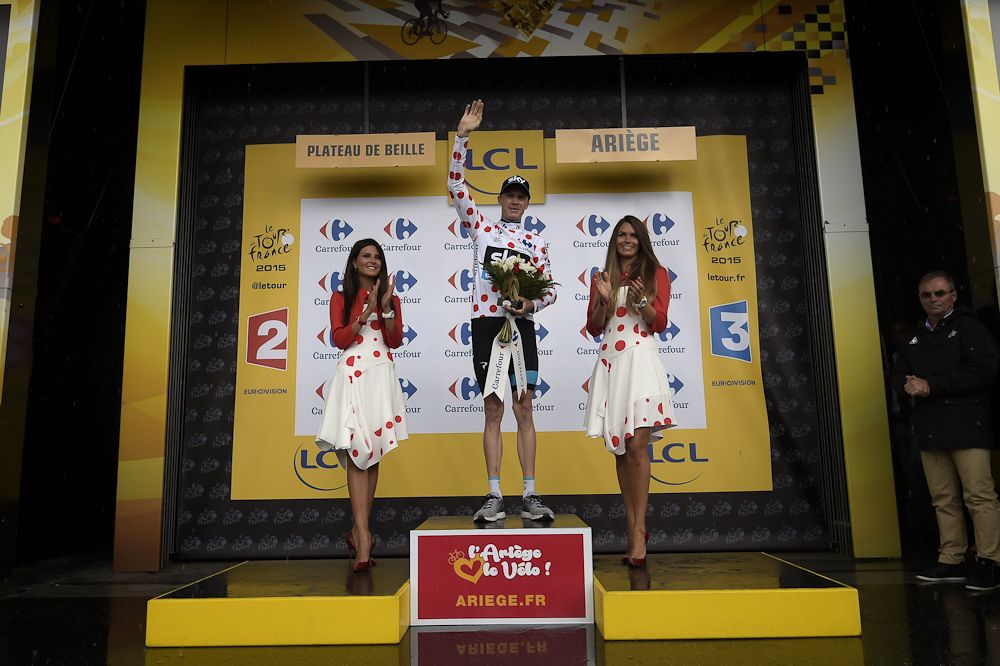 Chris Froome in polka dots on the stage 12 podium.