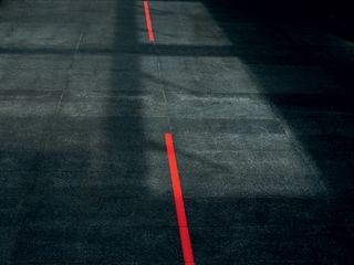 Close up view of red road markings