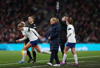 Sarina Wiegman, Manager of England, looks on as Ella Toone and Alessia Russo of England are substituted during the UEFA Womens Nations League match between England and Netherlands at Wembley Stadium on December 01, 2023 in London, England. (Photo by Naomi Baker - The FA/The FA via Getty Images)
