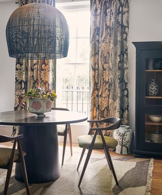 Dining room with round table and pendant light