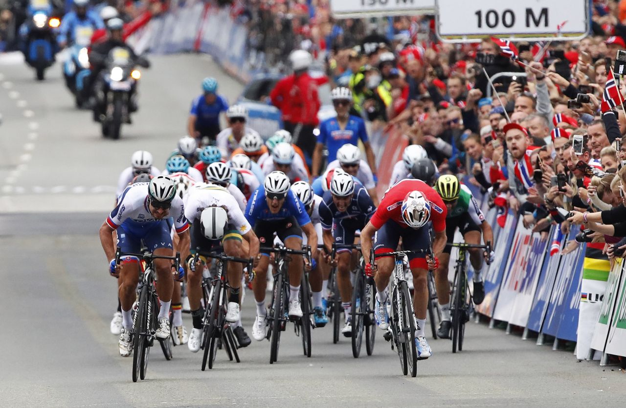 Peter Sagan (Slovakia) out-sprints Alexander Kristoff (Norway) to win his third straight world title