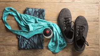 Trail running kit laid out on the floor