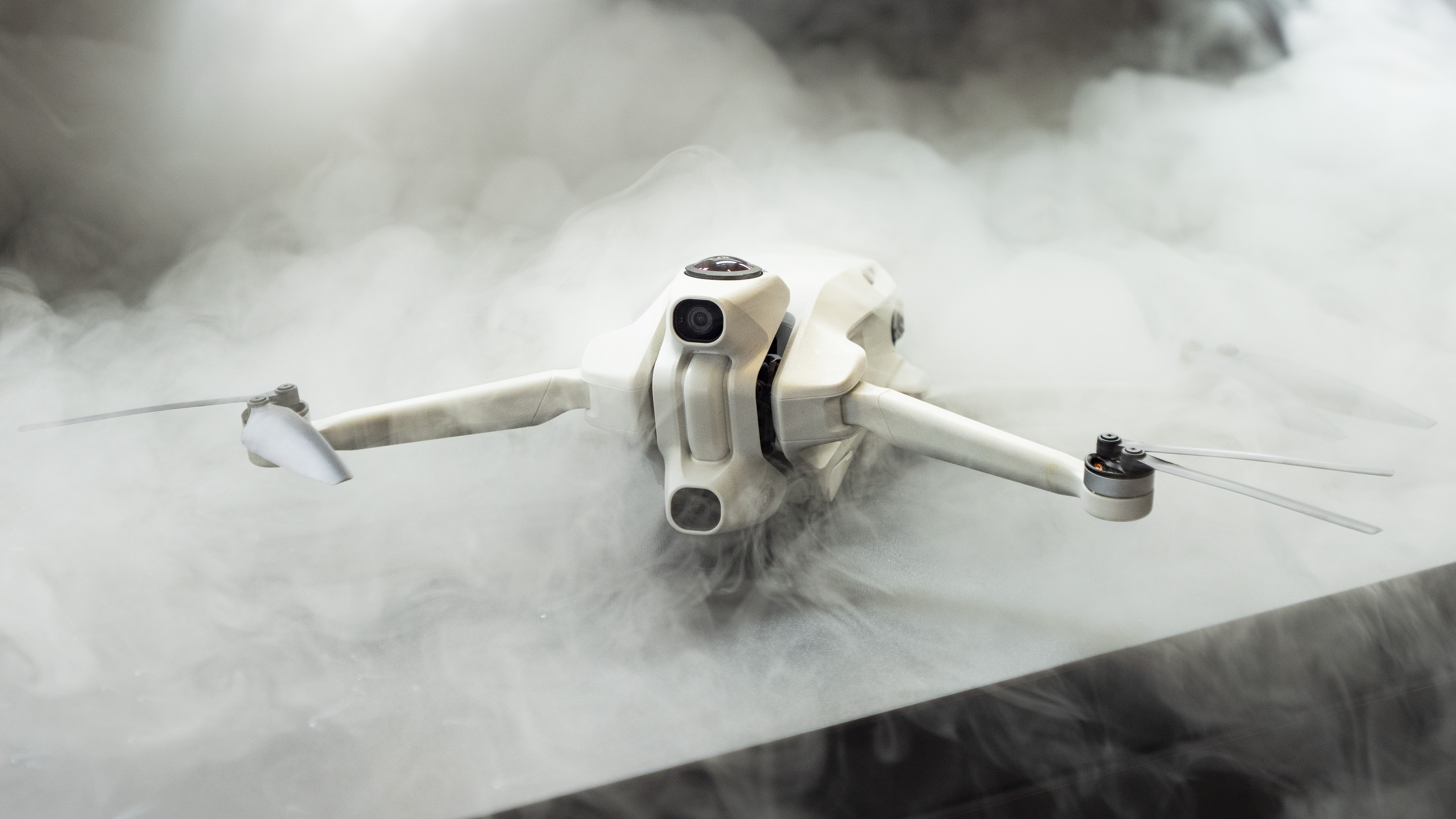Antigravity A1 drone by Insta360 emerging from cold mist