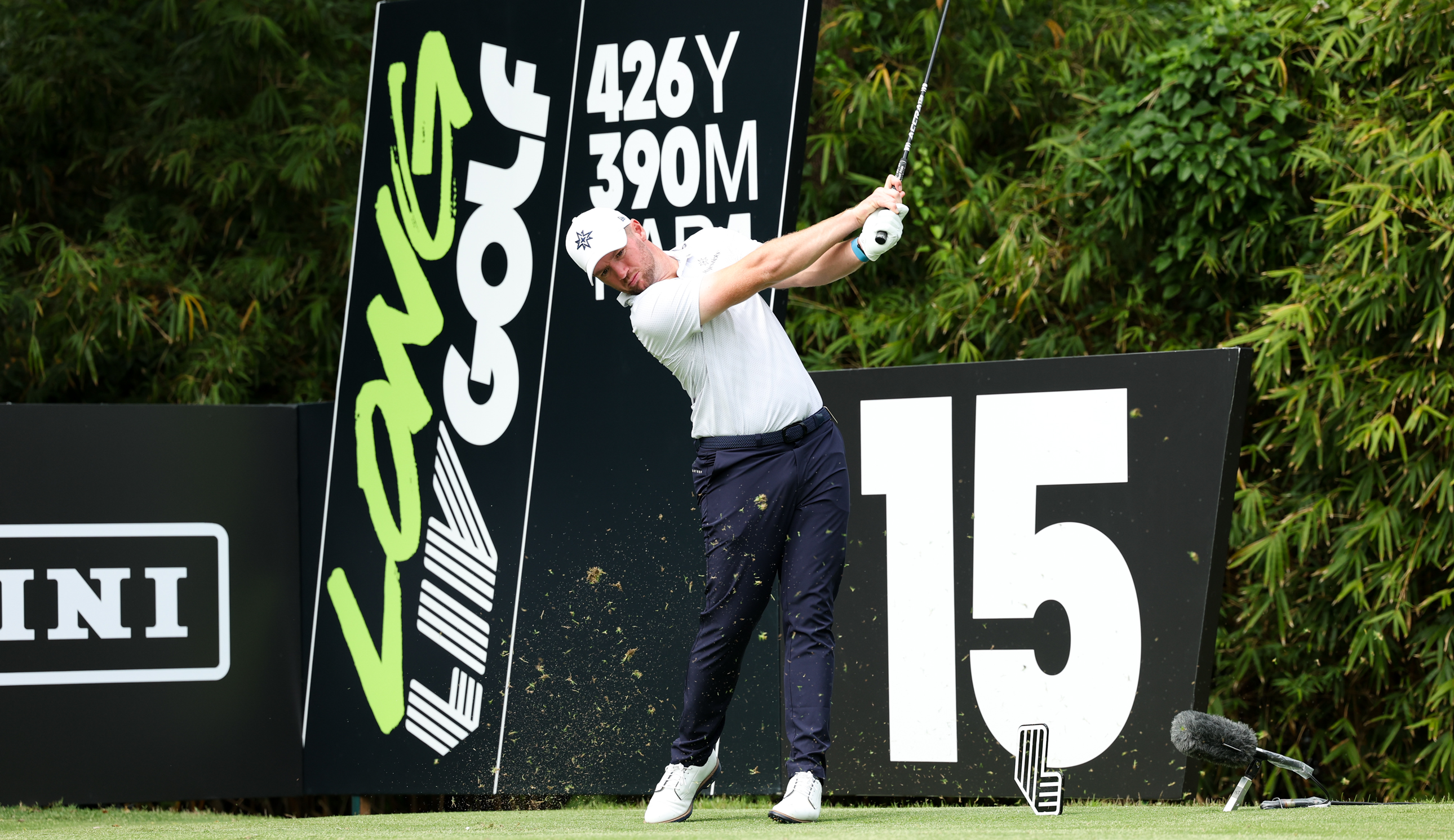 Sam Horsfield hits an iron shot off the tee