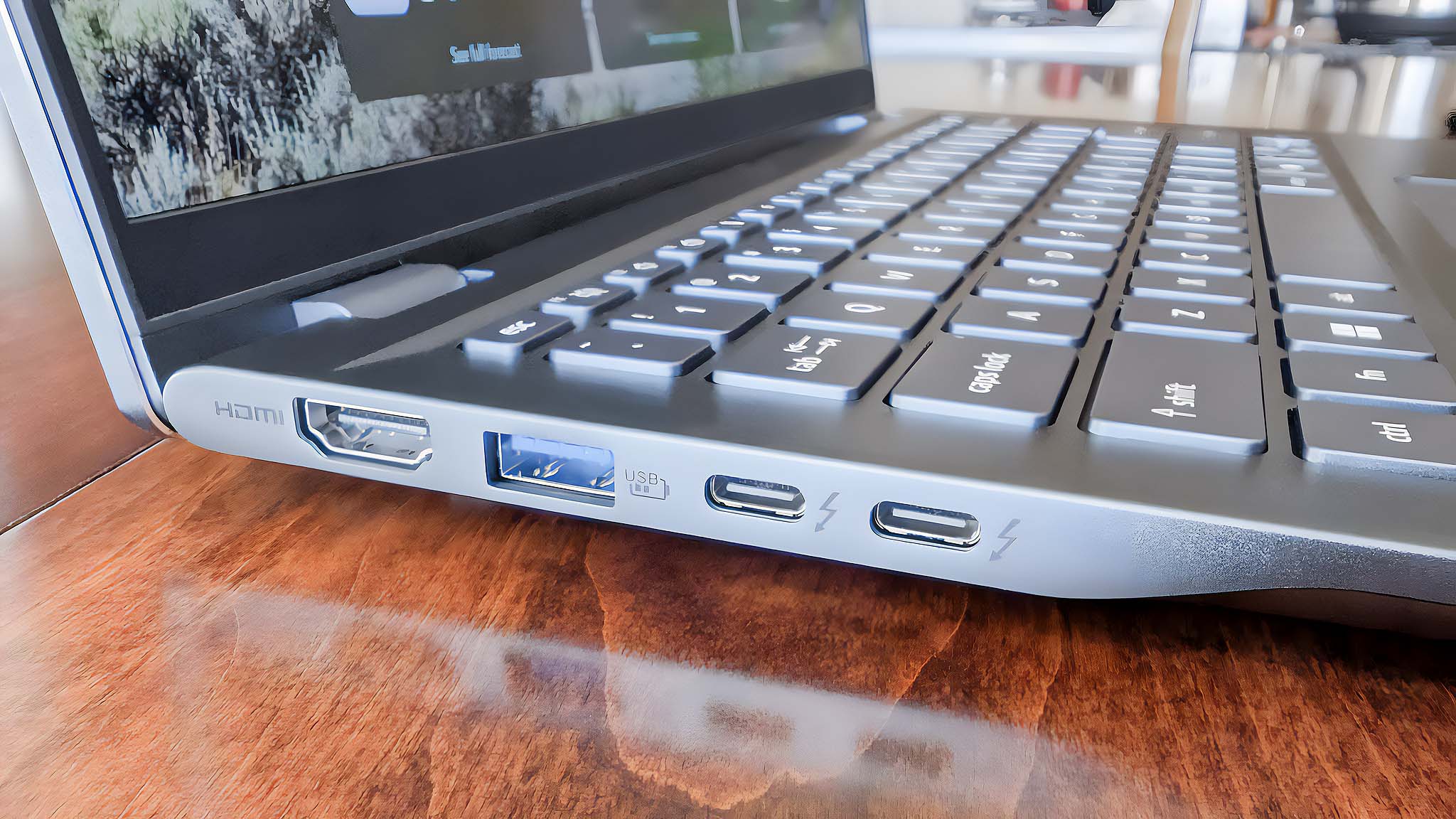 Closeup of Acer Swift 14 AI's right side HDMI, USB-A, and two USB-C ports.