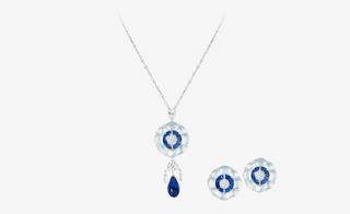 Ceylon sapphire and moonstone set with round-shaped old-cut diamonds