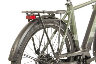Raleigh Centros e-bike features a rear pannier rack and built-in rear light