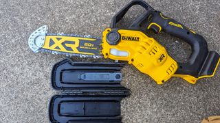 DeWalt DCCS623B 20V MAX 8 in. Brushless Cordless Battery Powered Pruning Chainsaw being tested in writer's home