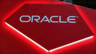 Oracle sign on a red background