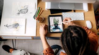 An artist uses one of the best drawing apps for iPad