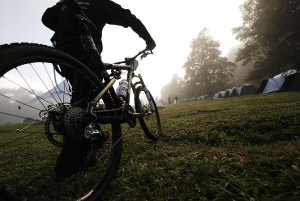 A rider rolls out from tent city.