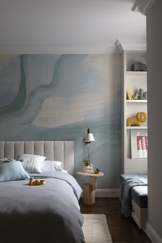 kids bedroom with paint-effect light blue wallpaper