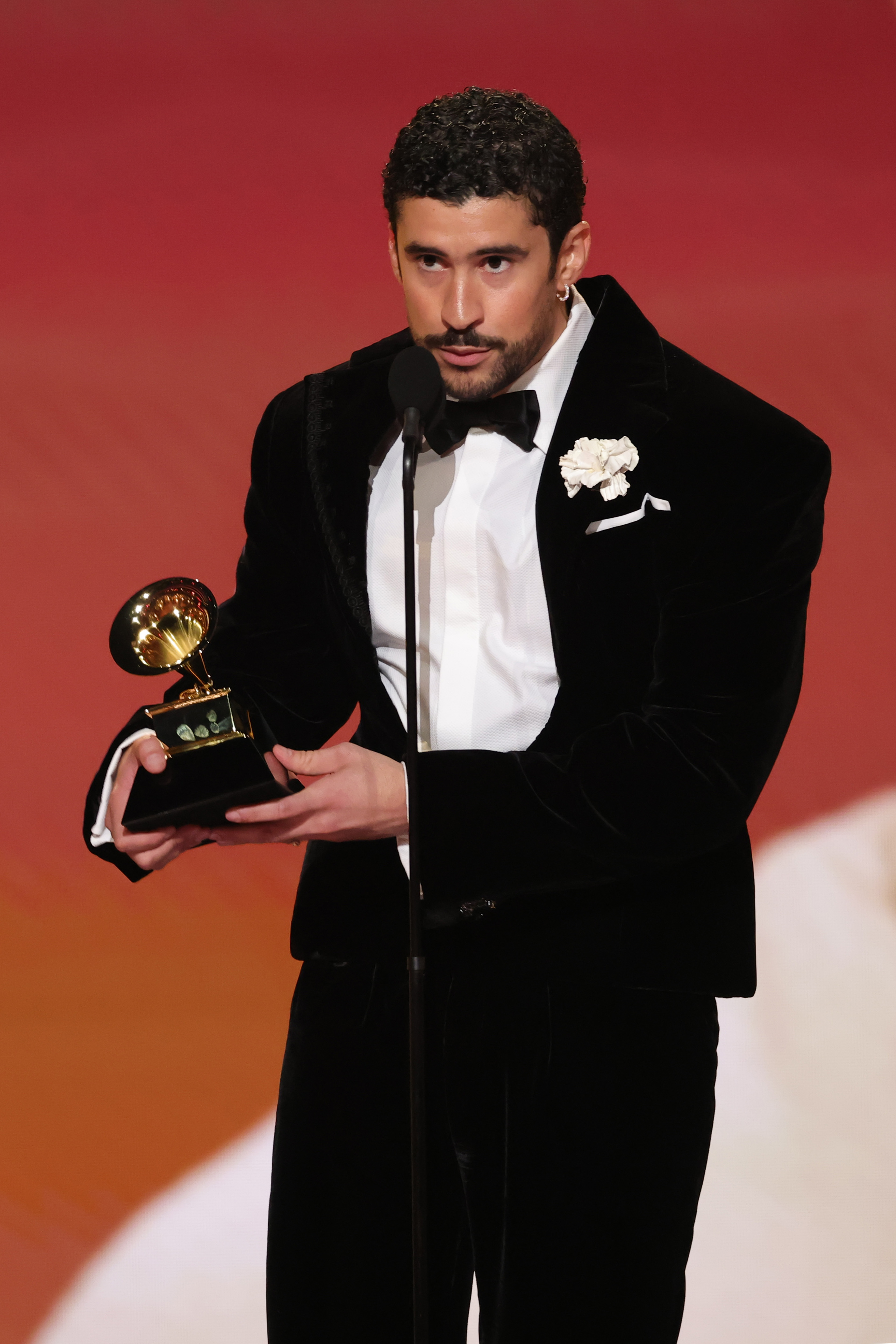 LOS ANGELES, CALIFORNIA - FEBRUARY 01: Bad Bunny accepts the Best M&amp;uacute;sica Urbana Album onstage during the 68th GRAMMY Awards at Crypto.com Arena on February 01, 2026 in Los Angeles, California. (Photo by Kevin Winter/Getty Images for The Recording Academy)